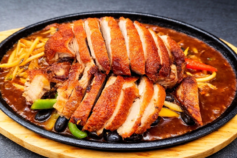 P9 Canard laqué sur plaque chauffante 铁板鸭