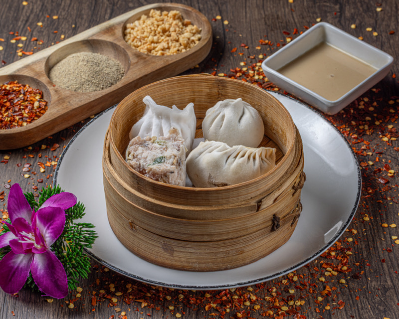 20. Assortiment de raviolis cuits à la vapeur (4pcs)