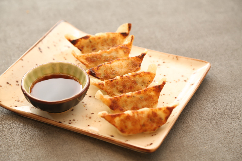 B5. Gyoza grillés au porc (5 pièces)